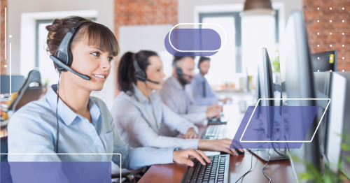 contact center agents with headsets on at their computers taking calls in the office