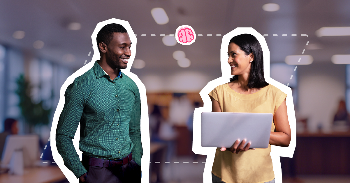 Employees sharing knowledge with each other at work.